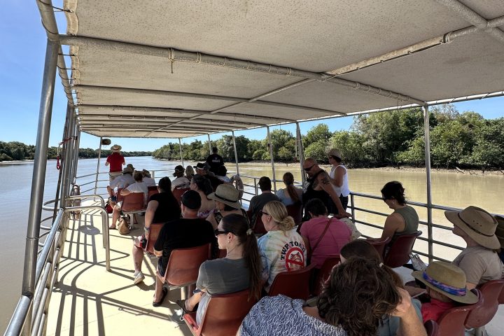 a group of people on a bridge