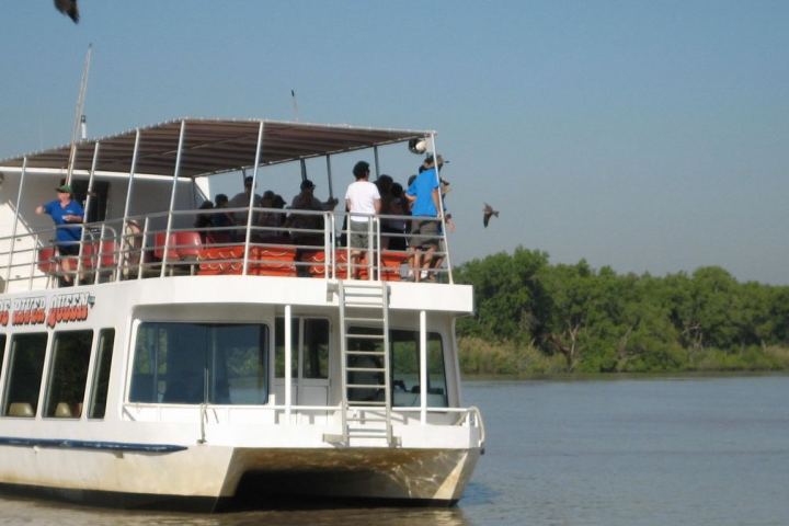 a small boat in a large body of water